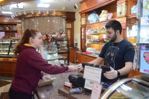 Emma Soufane purchases baked goods at Shatila in Dearborn