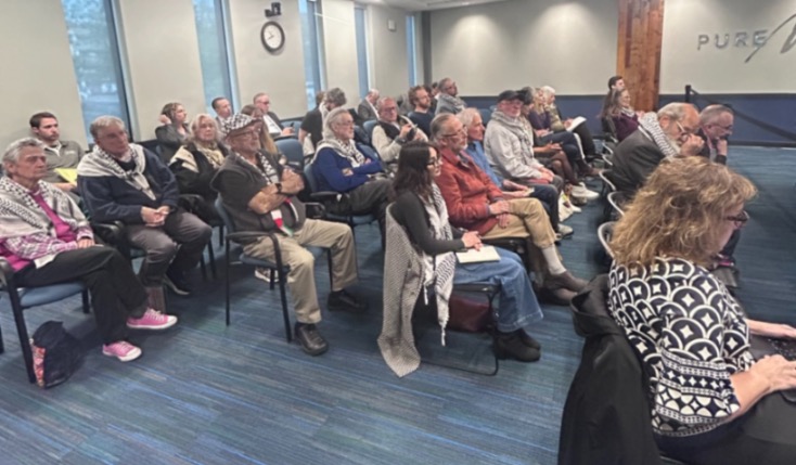 Protestors from the “MI Money Out of MIBA” campaign attended the Tuesday, May 12 meeting at MEDC in Lansing, MI / Photo cred: MI Money Out of MIBA campaign